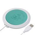 USB heated coaster with PU leather surface in black, blue, and orange colours for drink warming