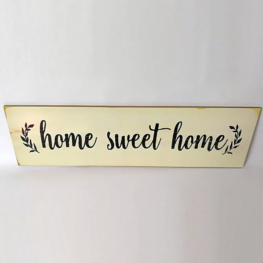 Hand-carved wooden wall hanging ornament, 40cm long, shown in black and white finish options.
