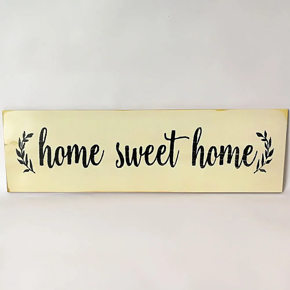 Hand-carved wooden wall hanging ornament, 40cm long, shown in black and white finish options.