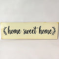 Hand-carved wooden wall hanging ornament, 40cm long, shown in black and white finish options.