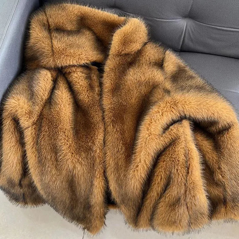 Loose silver grey artificial fur coat for women with a mid-length design.