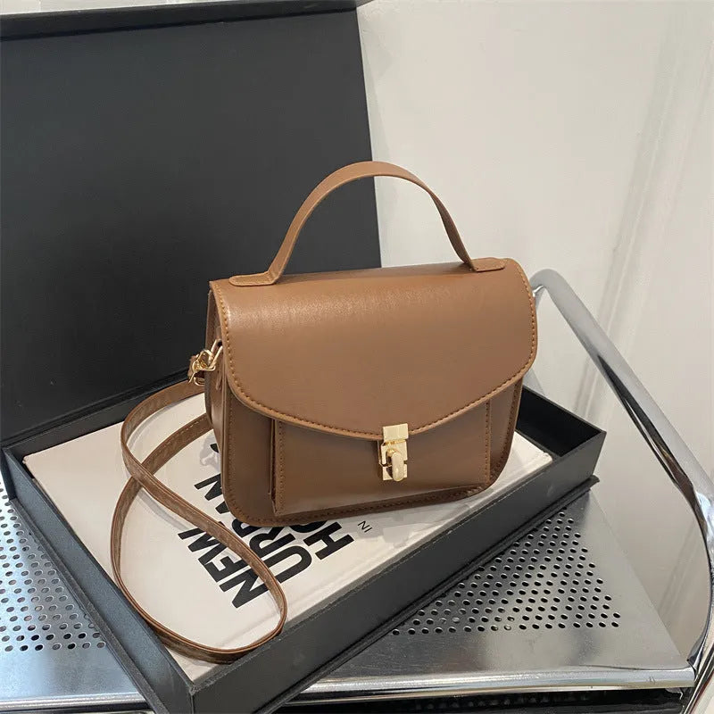 PU leather messenger bag in horizontal square shape with crossbody strap