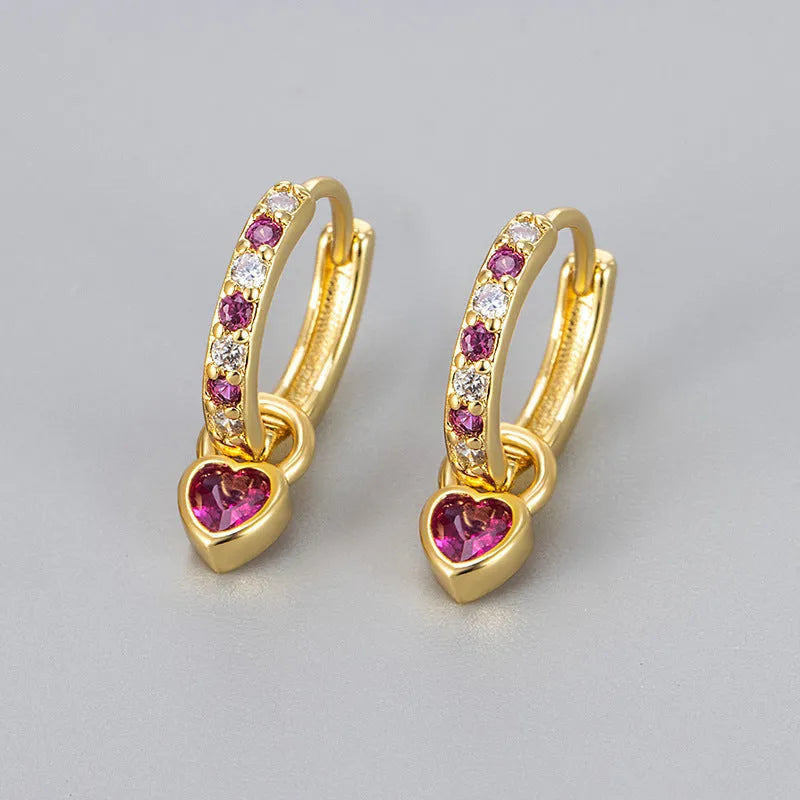 Women's fashion earrings with heart-shaped drops featuring coloured zircon stones in gold or white gold colour plating