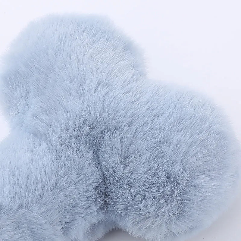 Set of colourful love bone shaped plush dog toys with squeakers for interactive play