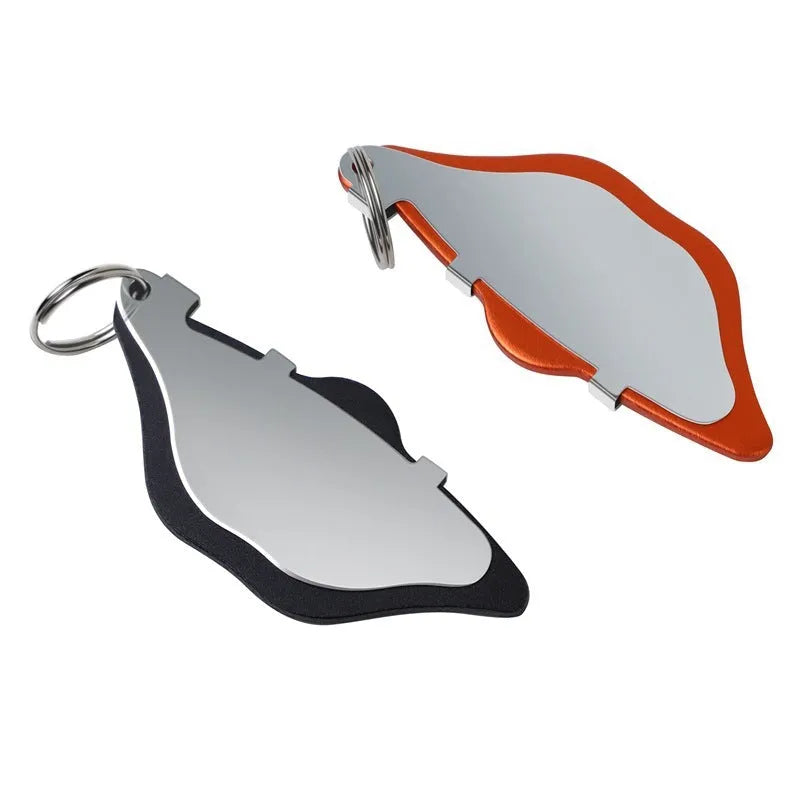 Mountain bike disc brake pad replacement set in black or orange with adjustment flap