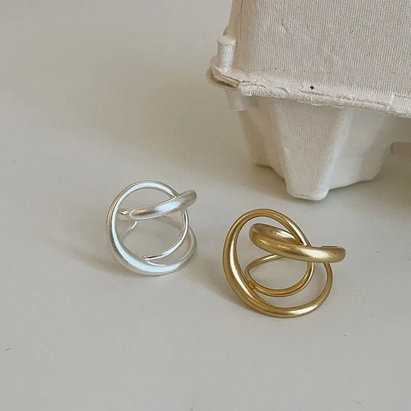Women's geometric open ring with three-dimensional interlaced matte metal design