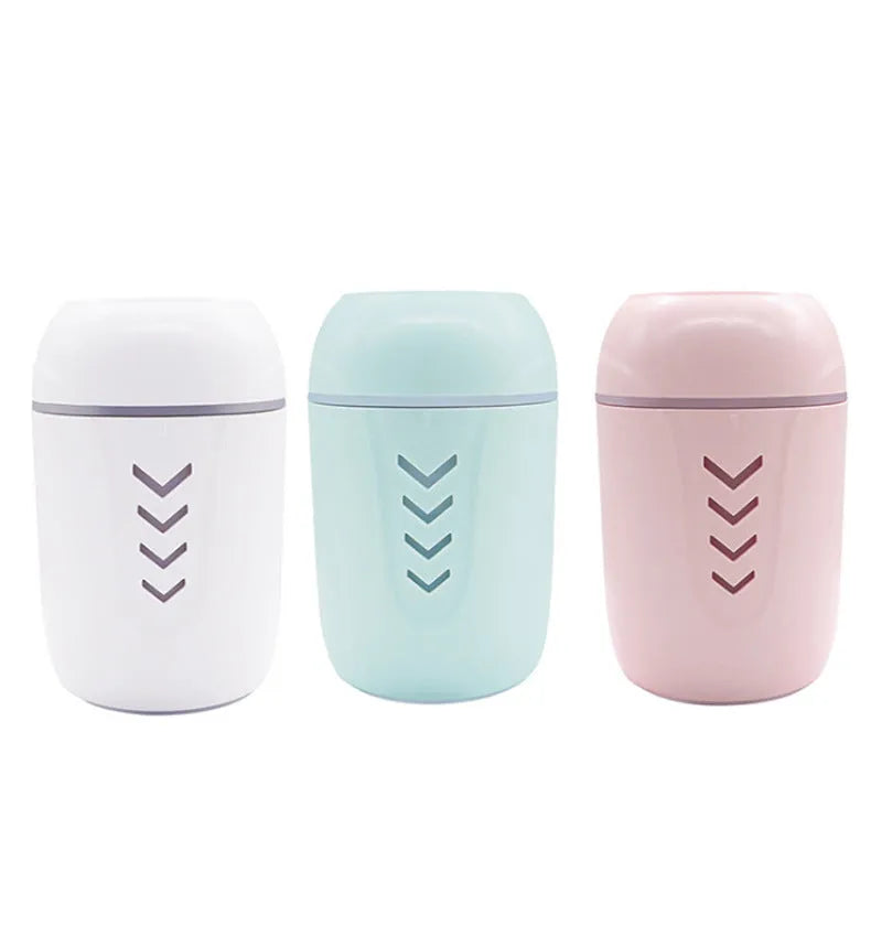 Portable car humidifier with columnar design in blue, pink, and white colour options