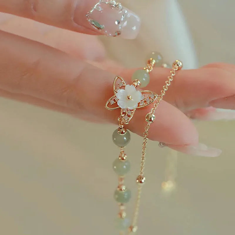 Yellow gold electroplated copper butterfly bracelet with geometric shape for women