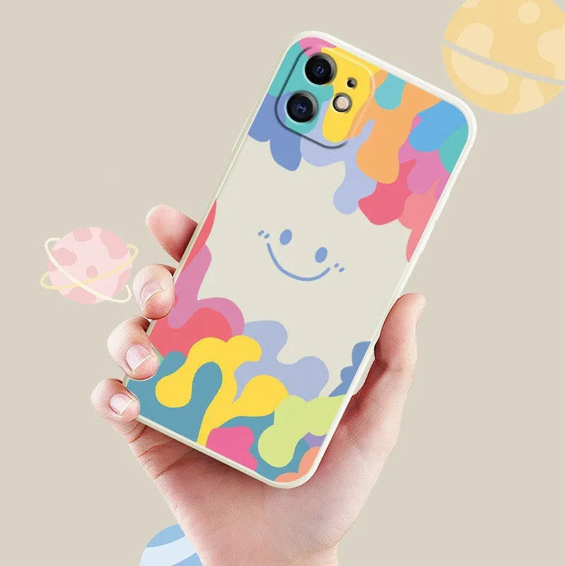 Colourful rainbow smiley face design on white TPU iPhone case with attached lanyard