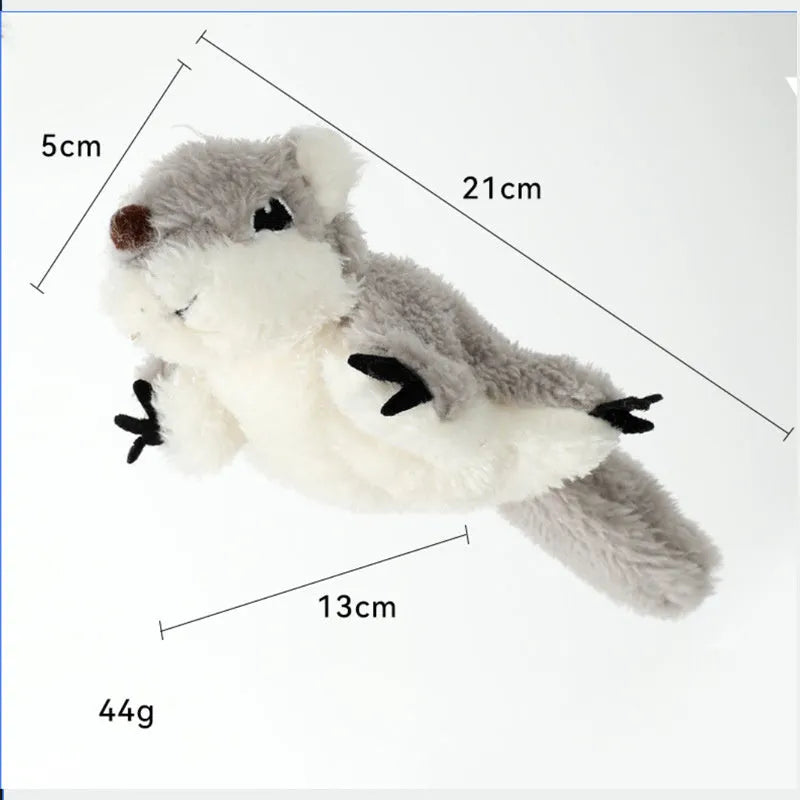 Grey flapping squirrel cat toy with waving wings on a floor