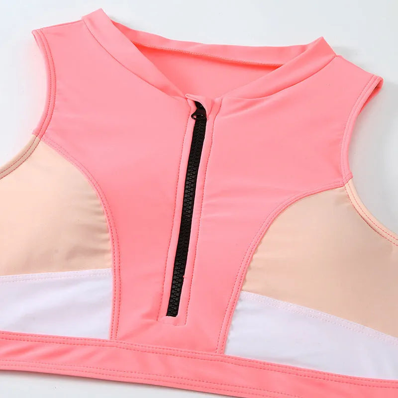 Pink high-waist women's bikini swimsuit with briefs style on a mannequin.