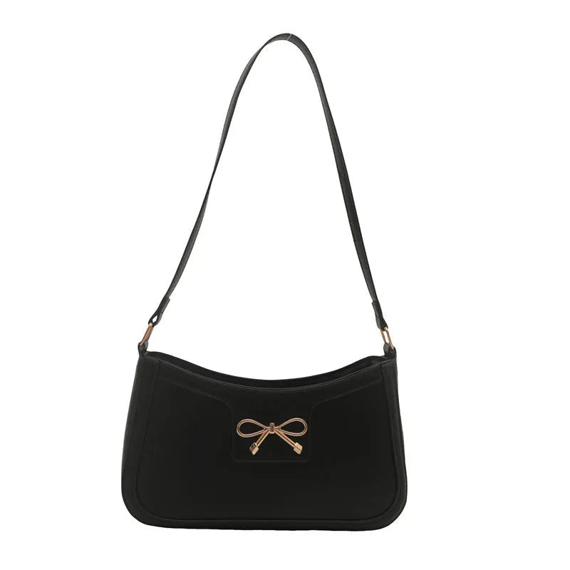 Square PU leather shoulder bag with a single strap and bow decoration in a choice of six colours