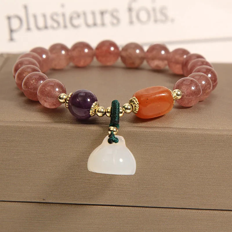 Women's multi-strand crystal bracelet with garnet, pearl, quartz, and jade pendants in Korean style design.