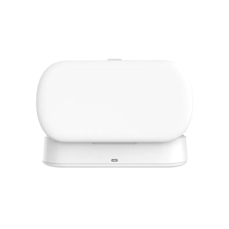 White ultraviolet steriliser box with wireless charging for mobile phones and personal items