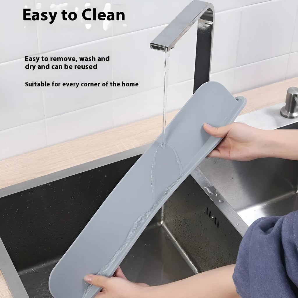 A thick grey silicone water blocking plate for a kitchen sink, showing its dimensions.