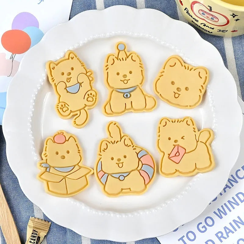 Three dimensional plastic biscuit mould showing puppy cartoon design impressions