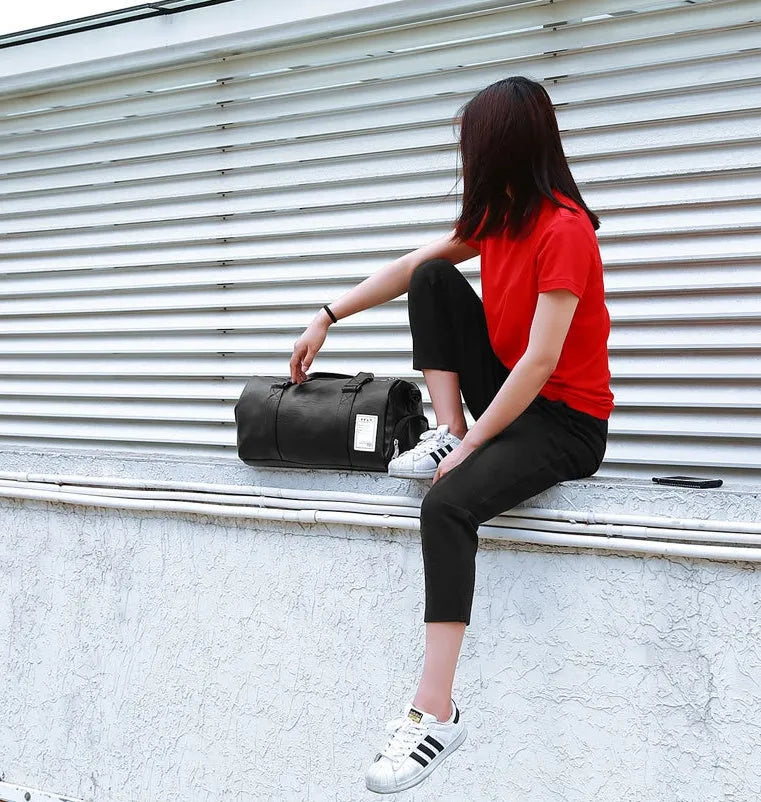 Black waterproof sports fitness bag with separate shoe compartments shown in two size options