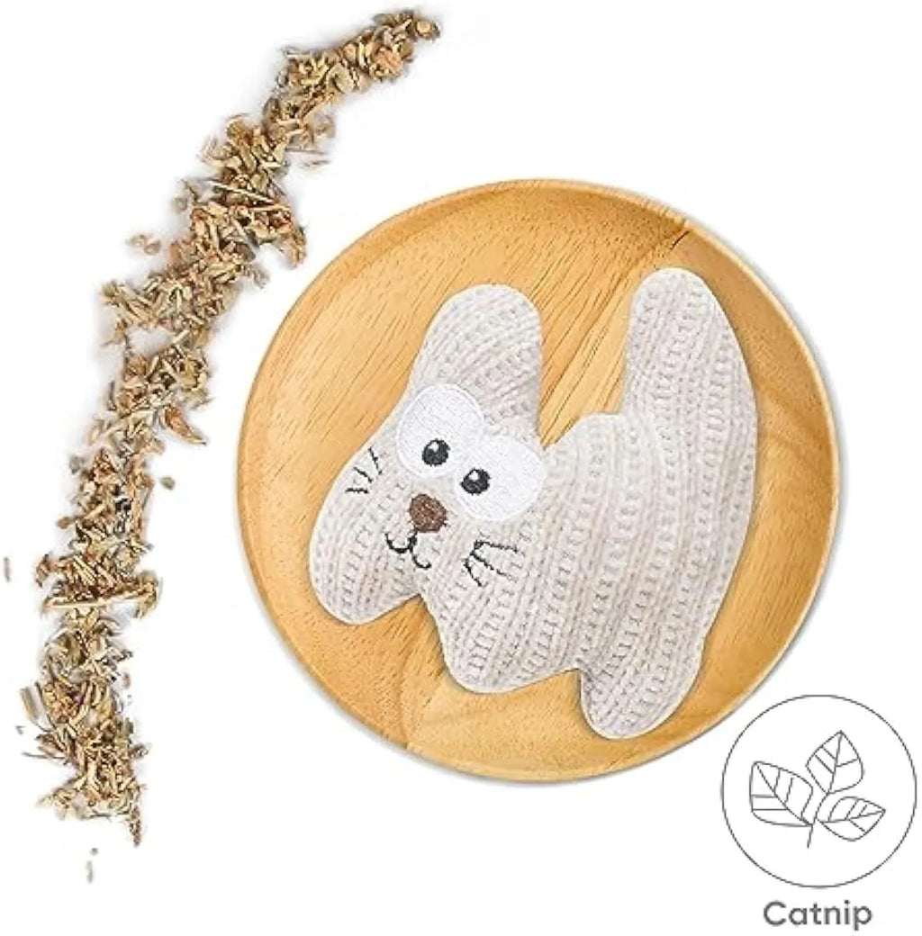 Cyan and light coffee coloured knitted plush cat toy with bell and catnip, shown next to a ruler showing 12cm length.