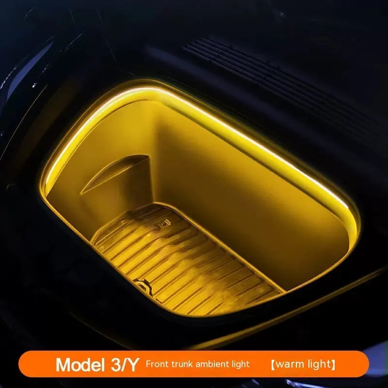 Tesla Model 3 front console illuminated by a soft silicone LED ambient light bar.