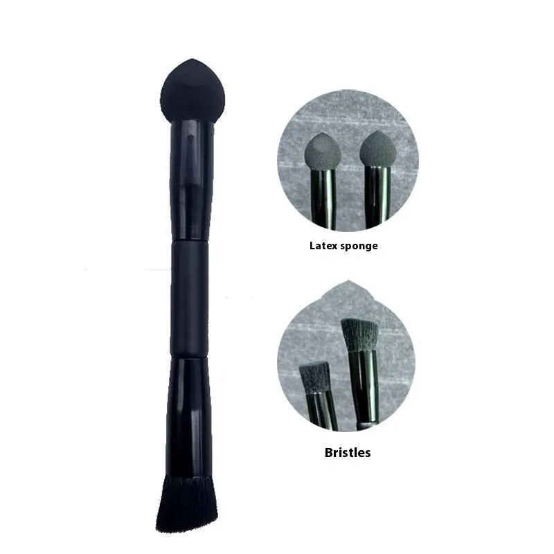 Black concealer brush with sponge tip and wooden handle for dark circle application