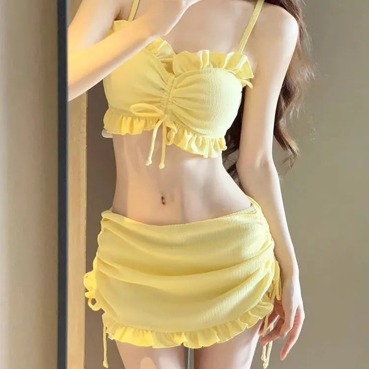 Women's milk silk bikini swimsuit in solid colour, showing top and pants.