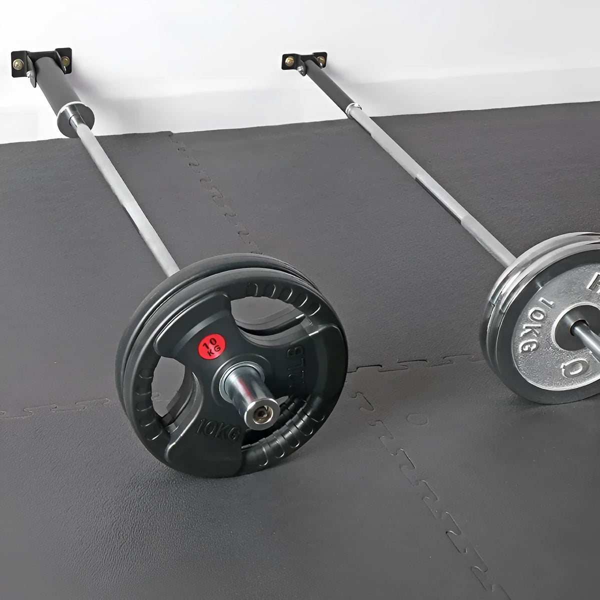 Steel pipe wall rack holding multiple barbell rods, with two inner diameter size options shown.