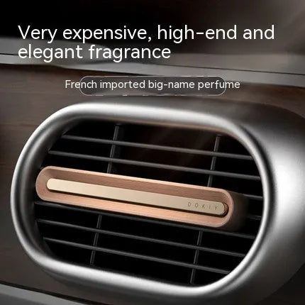 Long strip car aromatherapy ornament for air vent mounting in walnut or metallic grey finish