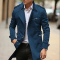 Plus size man wearing a mid-length camel-coloured lapel jacket with side pockets.