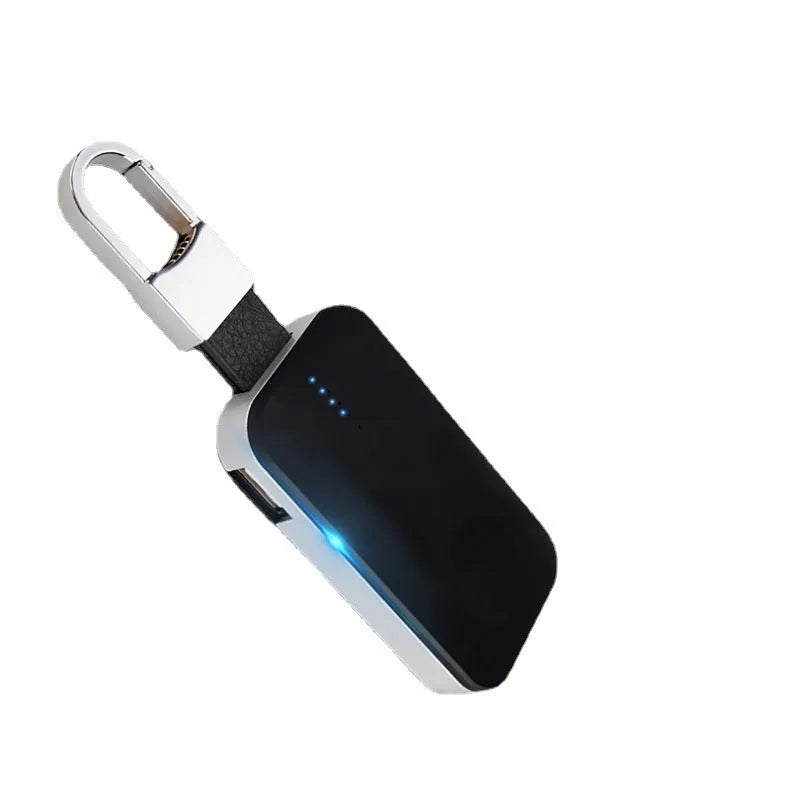 Black Apple Watch wireless charging power bank with keychain attachment for portable use