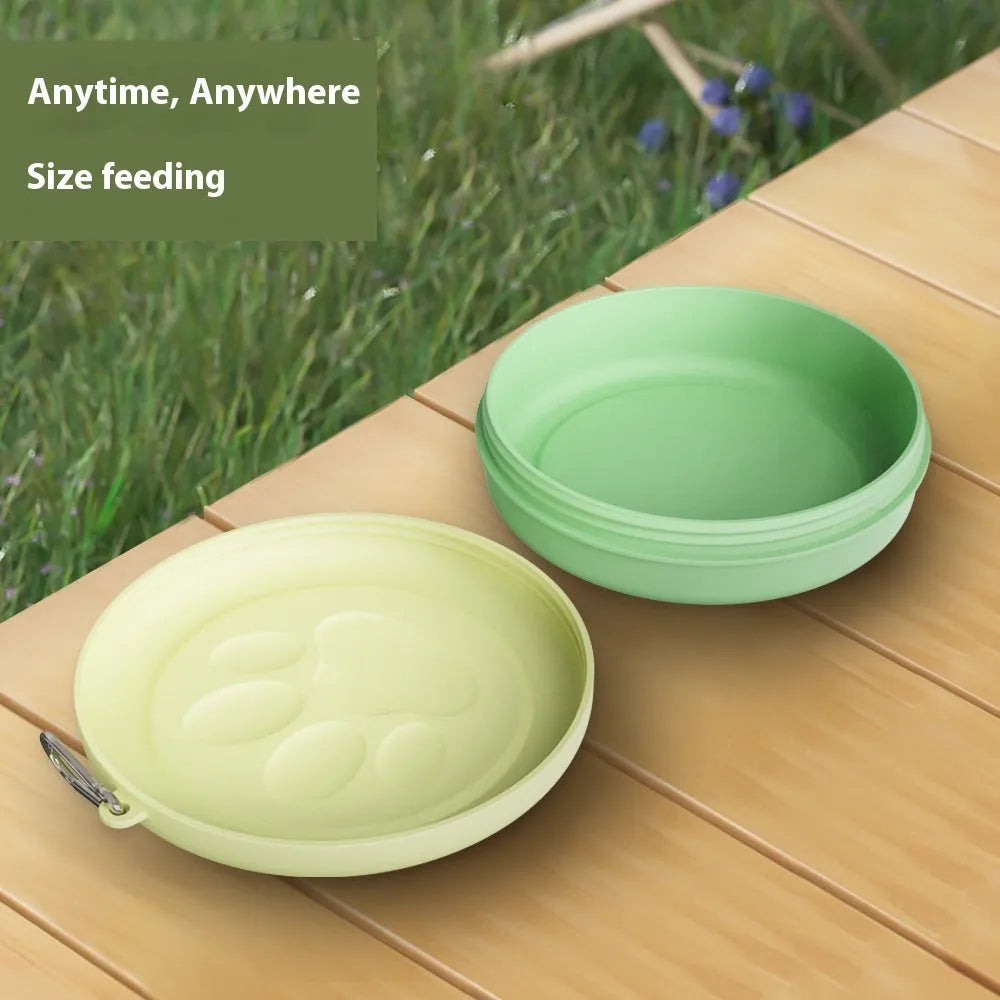 Portable foldable dog food and water bowl with snack box in light pink and green two-tone colour.