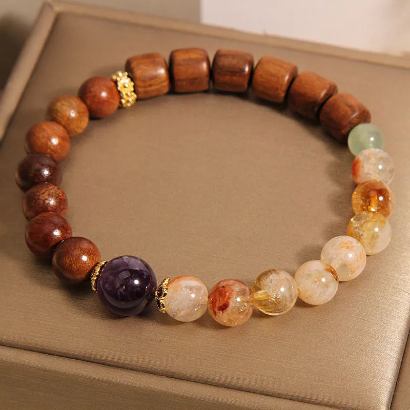 Women's bracelet with yellow tower crystal, ebony amethyst beads, pearl and rhinestone detailing in pineapple yellow colour.