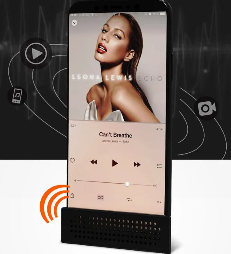 Mini black ABS mobile phone amplifier bracket holding an iPhone on a desktop.