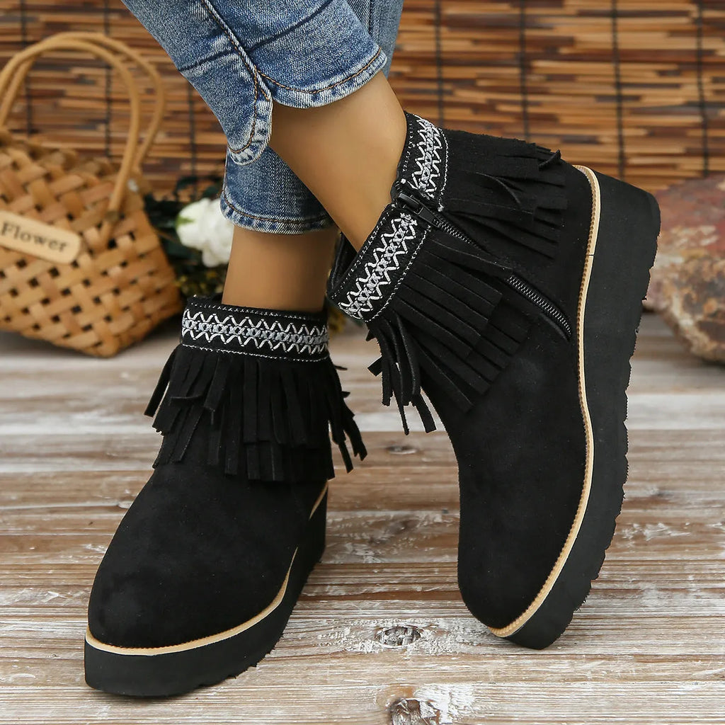 Women's dark brown suede wedge ankle boots with side zip, waterproof platform, and tassel detail.