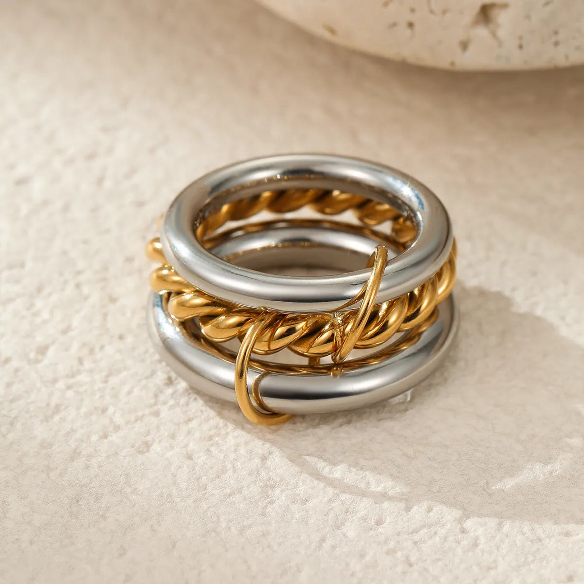 Women's stainless steel ring set with gold plating and stacked colour matching designs