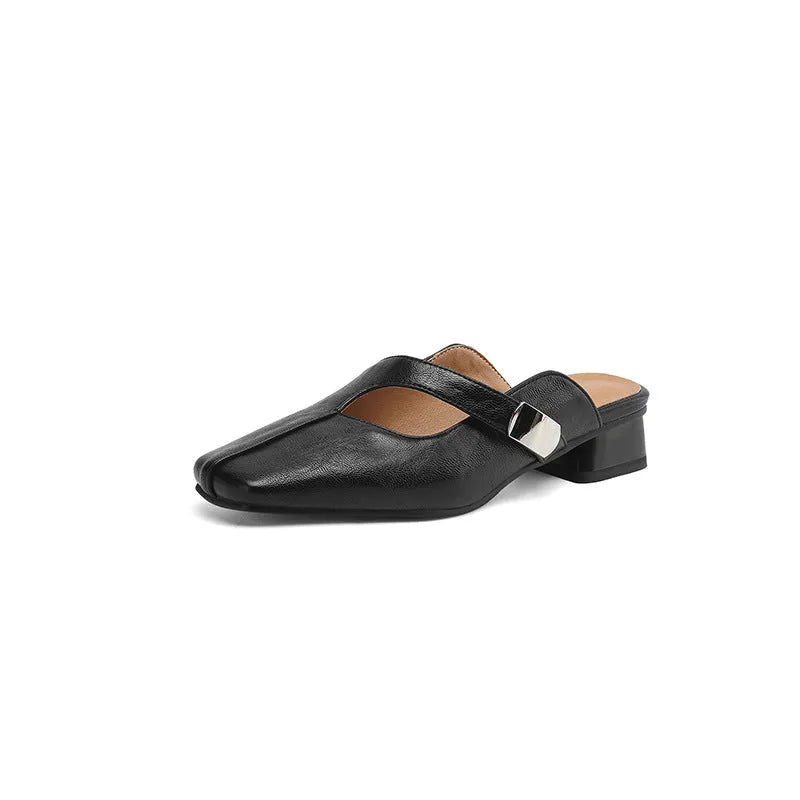 British style square toe leisure slippers in beige with a low heel and rubber sole.