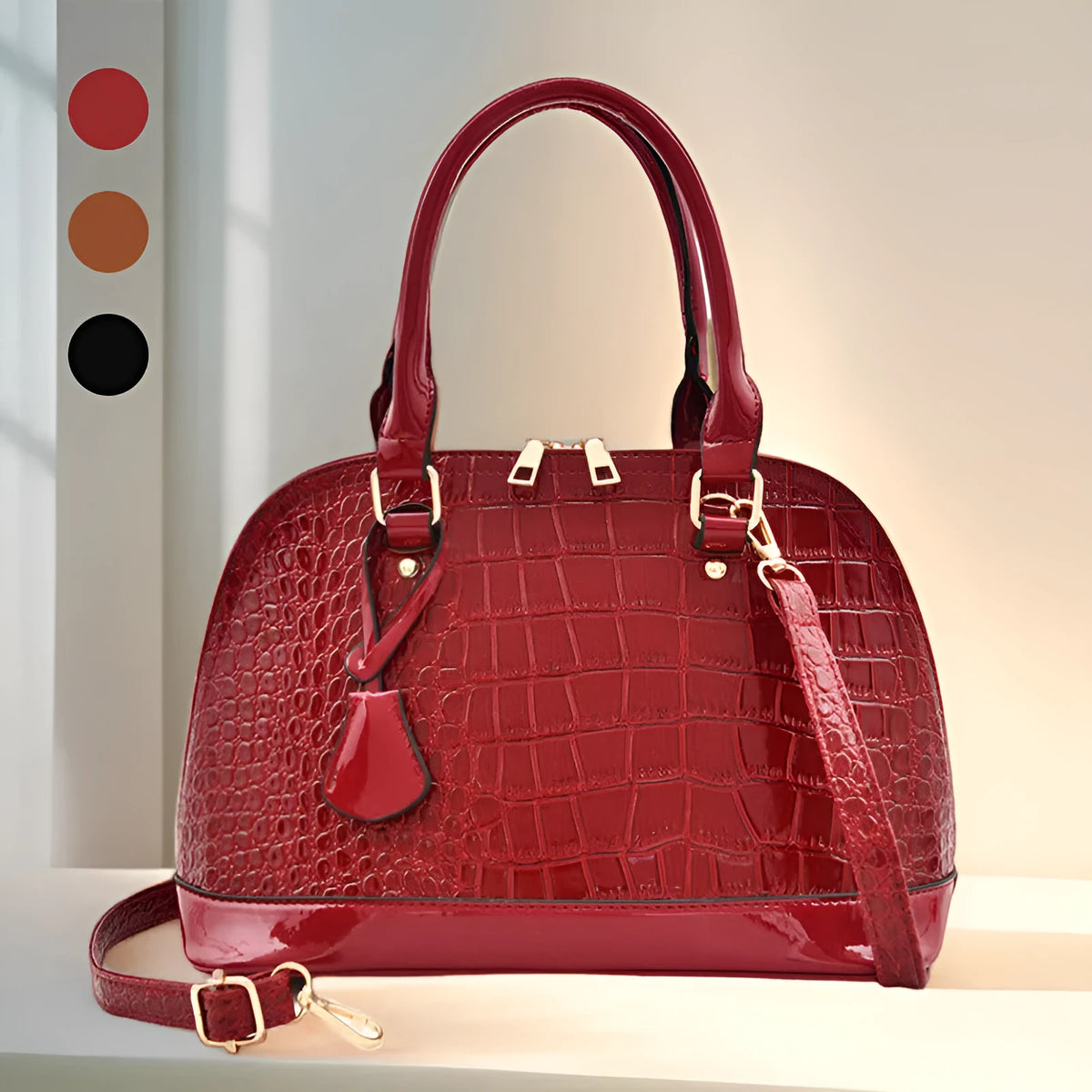 Shiny PU shoulder bag in shell shape showing black, brown, and red colour options