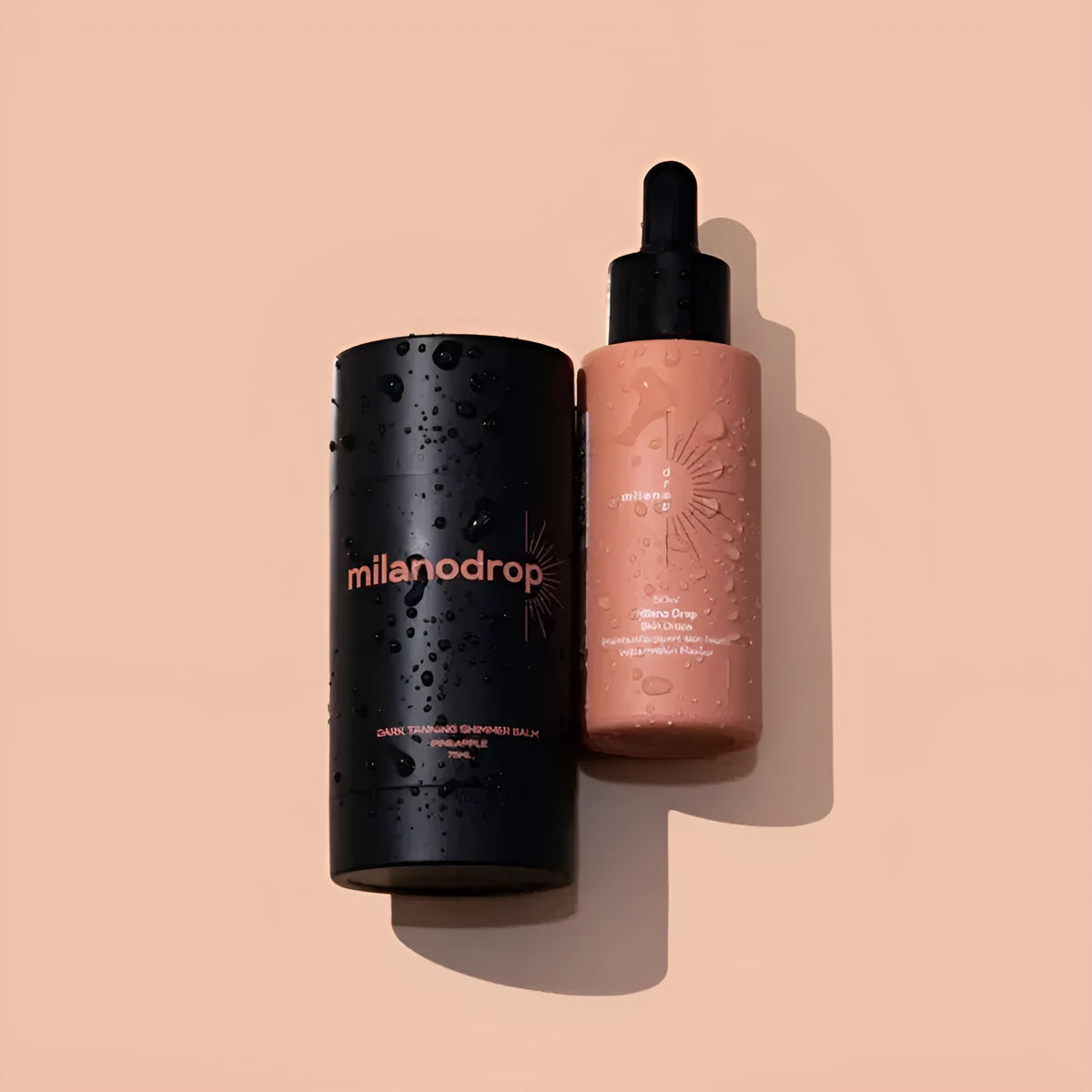 Black essence tanning drops bottle and tanning flash cream bottle for body care.