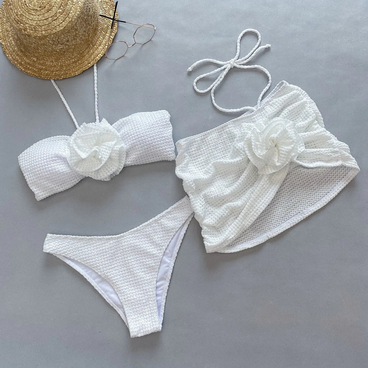 Women's 3D flower split three-piece bikini set in white or purple nylon spandex