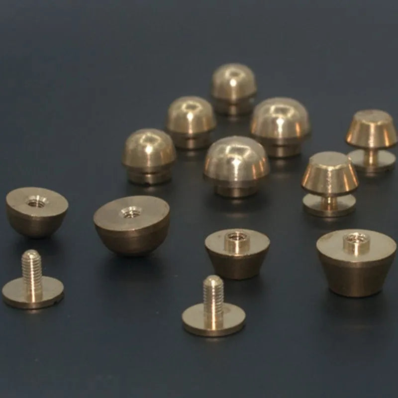 Brass decorative buckles showing 10mm and 12mm sizes with geometric and round foot nail designs