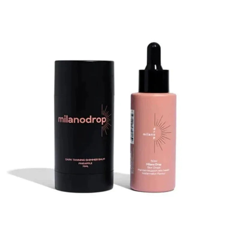 Black essence tanning drops bottle and tanning flash cream bottle for body care.