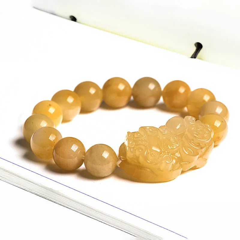 Hand-carved Golden Thread Jade Money Bracelet shown in large and small size options.