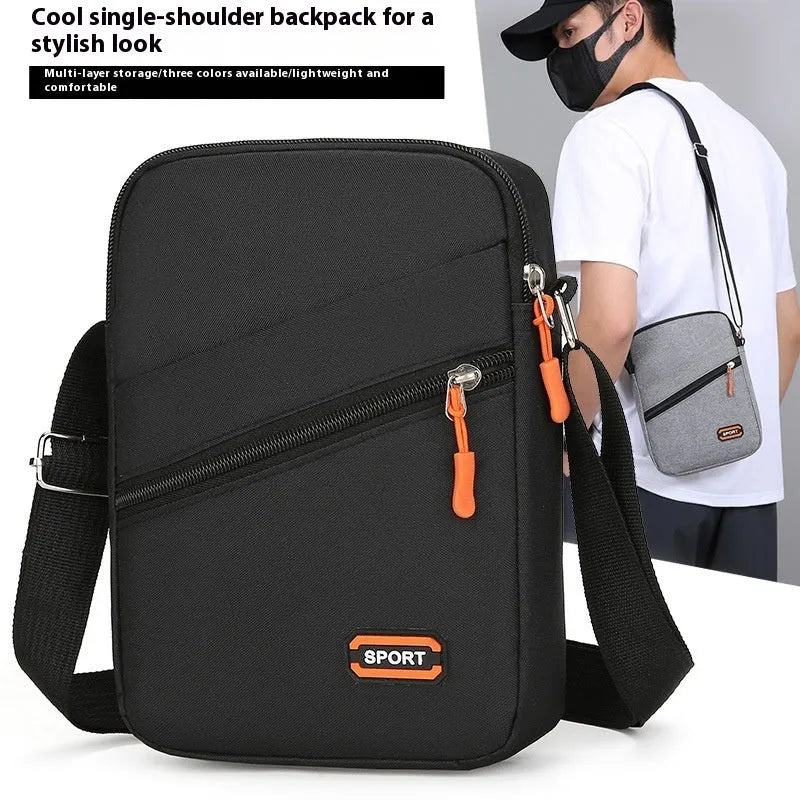 Ultra-light Oxford cloth commuter crossbody bag in solid colour with contrast trim