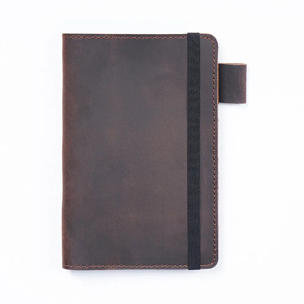 Handmade cowhide notebook with wood-free paper in six colour options showing 9x14cm dimensions