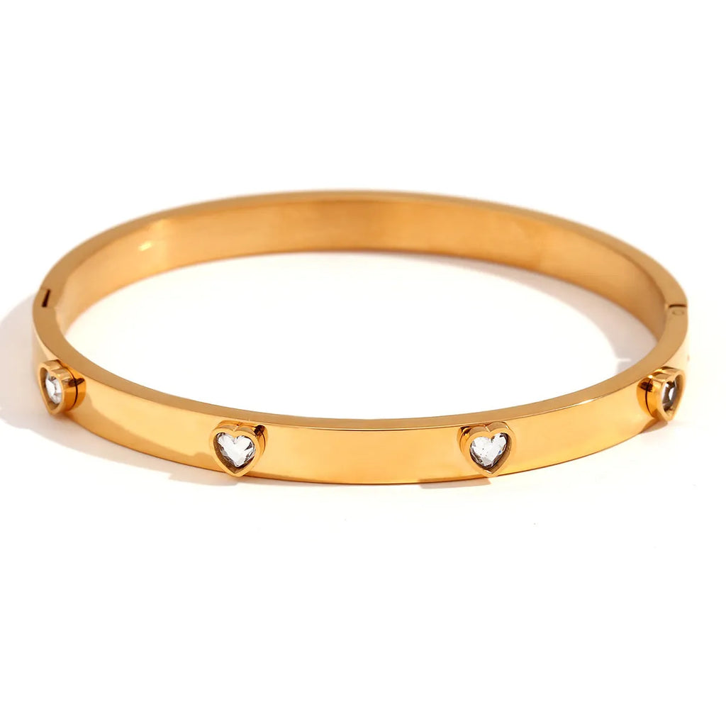 Golden electroplated stainless steel women's bracelet with micro-inlaid peach heart design