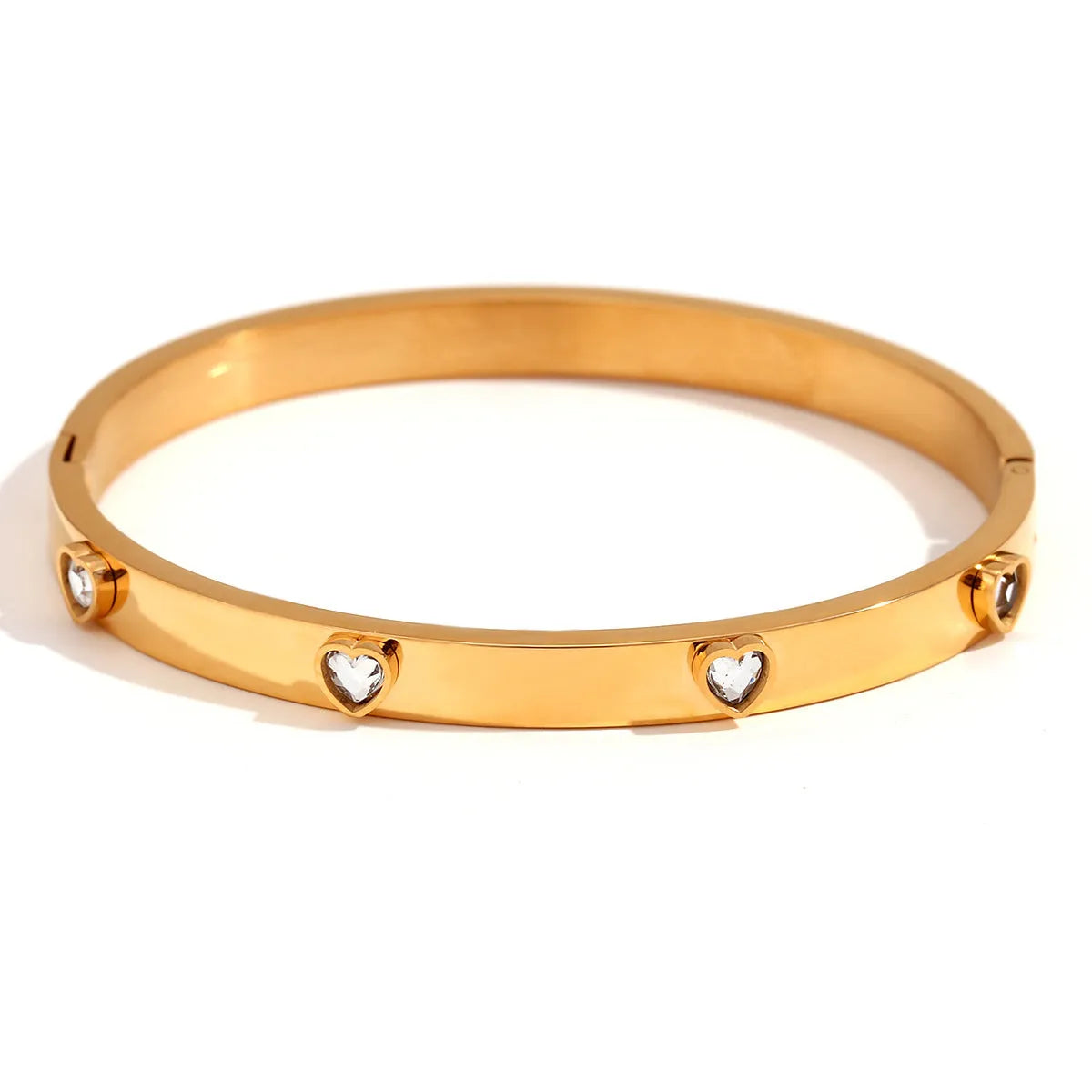 Golden electroplated stainless steel women's bracelet with micro-inlaid peach heart design