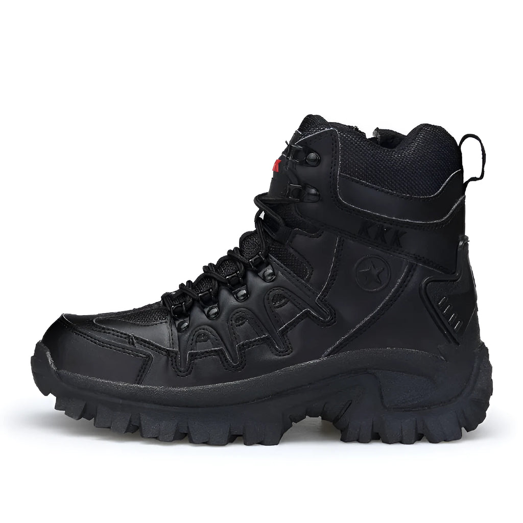 Men's black tactical military boots with rubber sole on an outdoor surface.