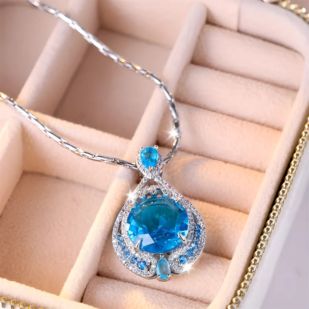 Blue crystal geometric pendant necklace with water wave chain for women's office wear