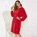 Women's black A-line midi dress with elastic waist and cinched belt, long sleeve cardigan-style