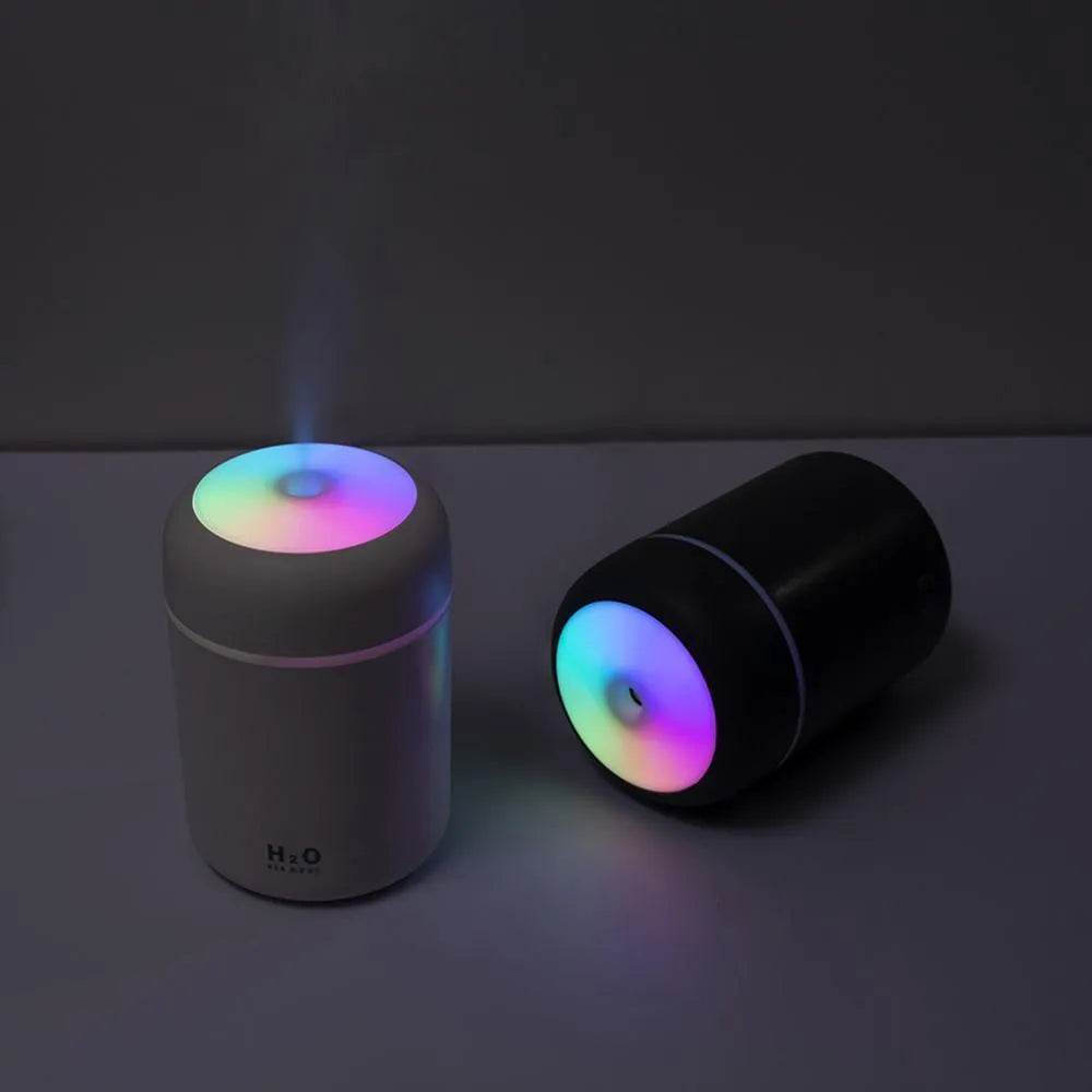 Pink USB desktop humidifier with 300ml water tank and colourful atmosphere lighting