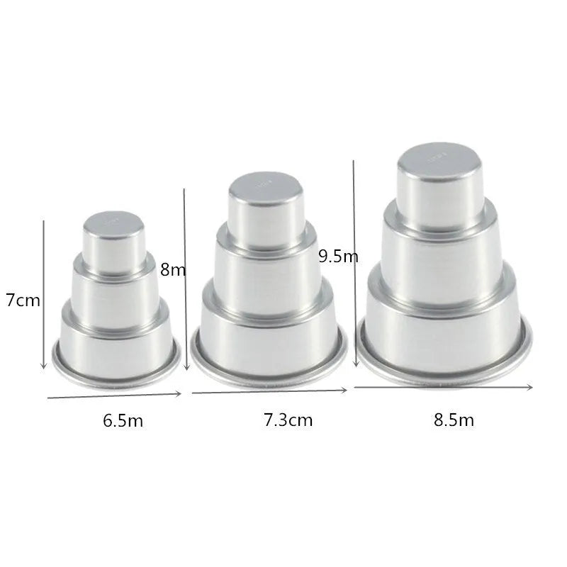 Set of three silver aluminium alloy cake moulds in large, medium, and small sizes for baking.